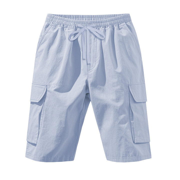 Men's knee-length utility shorts made of lightweight cotton blend with elastic drawstring waistband and patch flap pockets StylebySassy