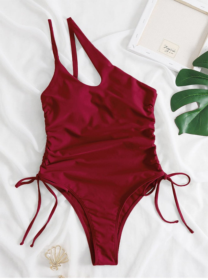 Women's one-piece swimsuit with sophisticated wrap detail and adjustable straps StylebySassy
