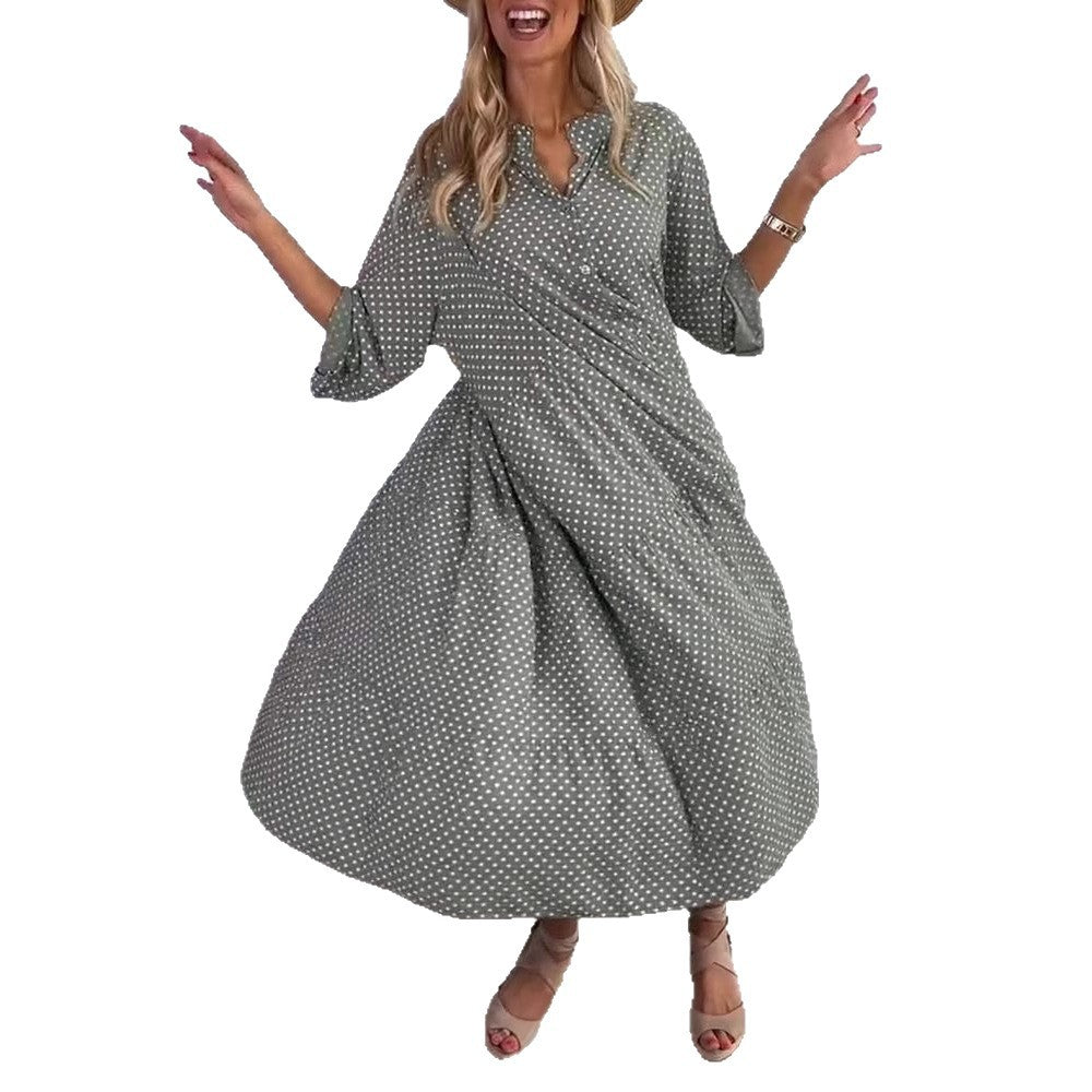 Women's lightweight flowing midi dress with polka dot pattern, tiered skirt and roll-up sleeves StylebySassy
