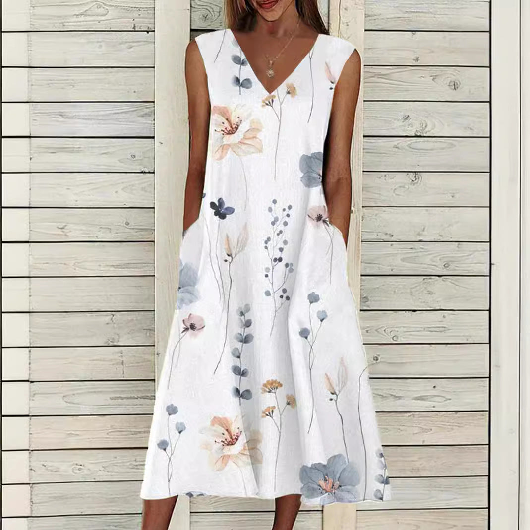 Women's maxi dress with separate bolero, V-neck, inset pockets, and floral A-line silhouette StylebySassy