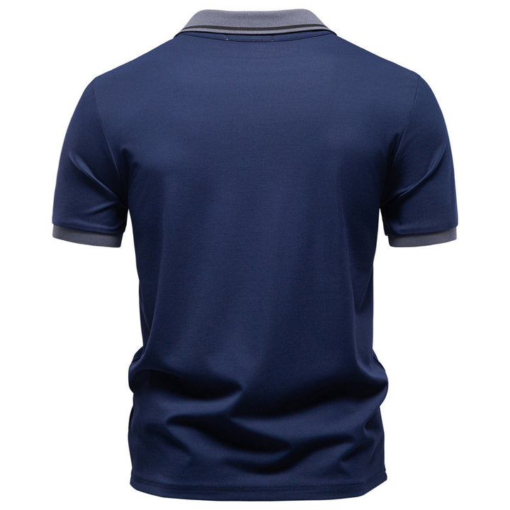 Men's breathable polo shirt made of cotton blend with contrast collar and ribbed sleeve cuffs StylebySassy