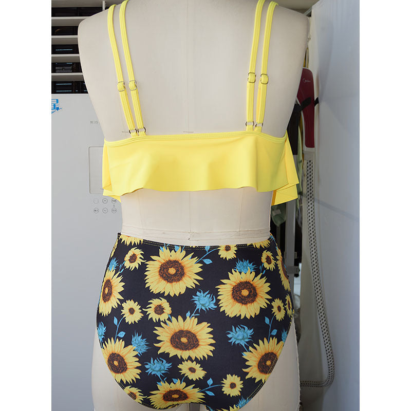 Women's swimsuit with stylish layered look and floral bottom StylebySassy