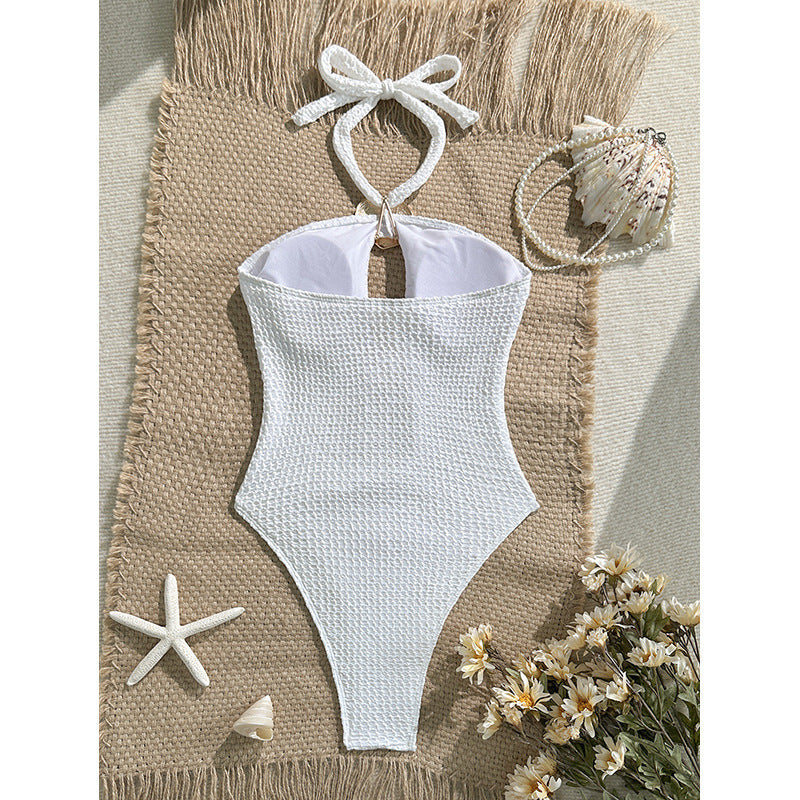 Women's one-piece swimsuit with sophisticated cut-out design and elegant fastenings StylebySassy