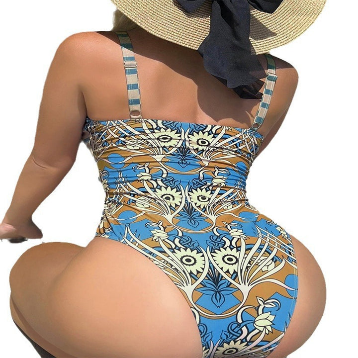 Women's one-piece swimsuit with modern wrap design and floral print StylebySassy