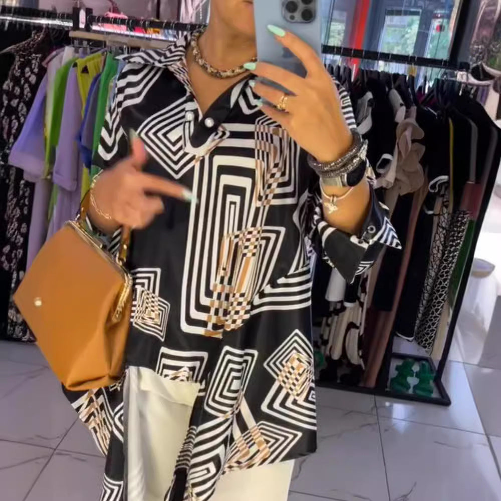 Women’s loose silk-look blouse with graphic square print, asymmetrical hem and mother-of-pearl button placket StylebySassy