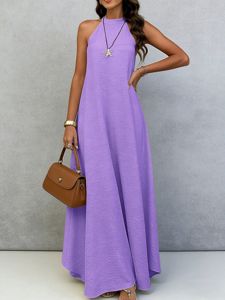 Women’s sleeveless maxi dress with high standing collar, flowing A-line and crepe texture StylebySassy
