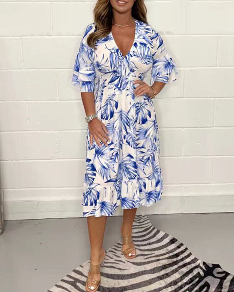 Women nan midi dress with leaf print, V-neck, gathered empire waist and ruffled tiers StylebySassy