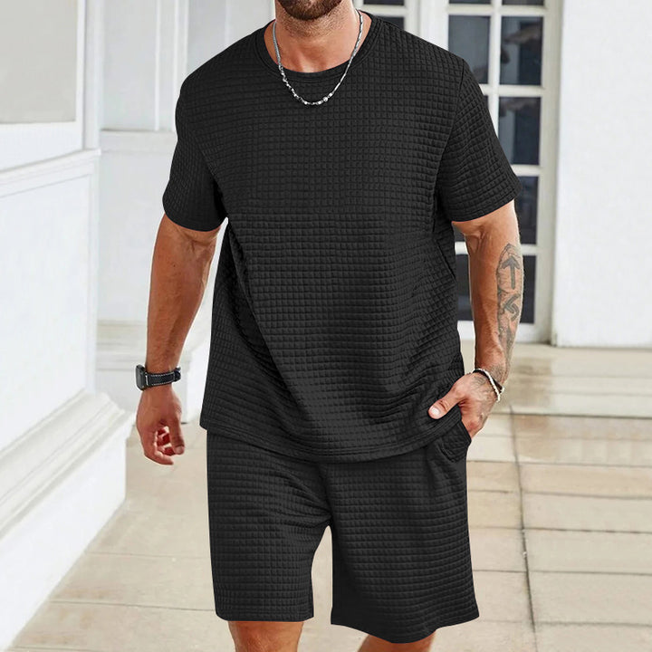 Men's waffle structure lounge and leisure set with wide-cut short-sleeve shirt and shorts with elastic waistband StylebySassy