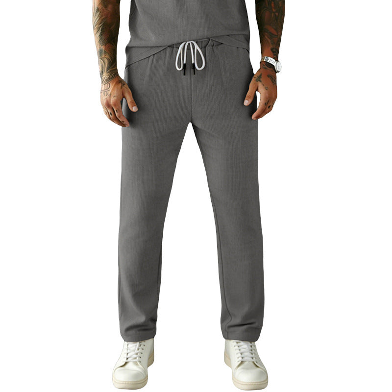 Men's narrow-cut comfort pants with elastic waistband, drawstring, and fine ribbed structure StylebySassy