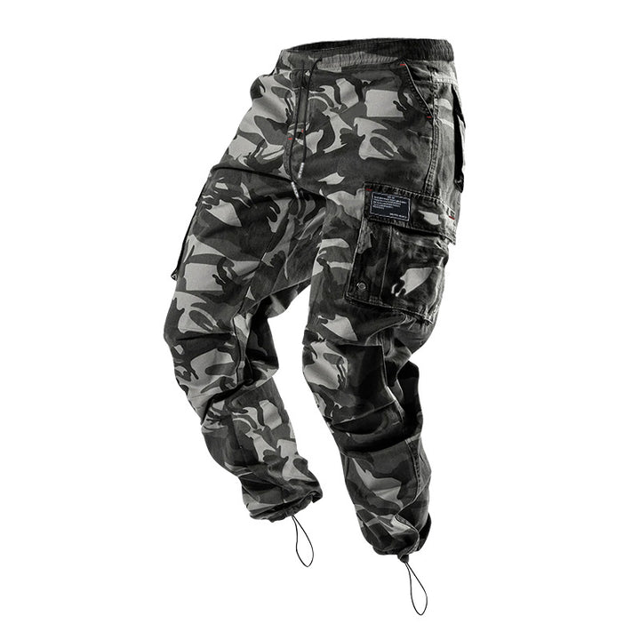 Men's multi-pocket casual trousers made of cotton twill with tapered leg and adjustable ankle drawstring StylebySassy