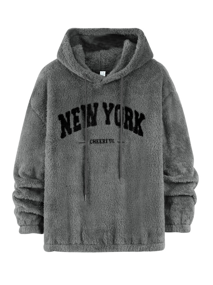 Unisex nan cozy plush hoodie with chenille logo, hood and elastic hem StylebySassy