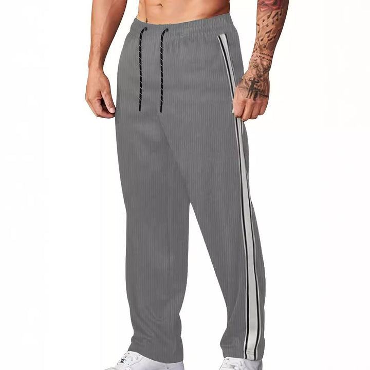 Men's knitted relaxed joggers with wide leg, side piping, and elastic drawstring waistband StylebySassy