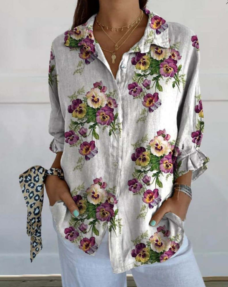 Women's lightweight linen-look shirt blouse with floral pattern, loose fit, roll-up sleeves, and patch pockets StylebySassy