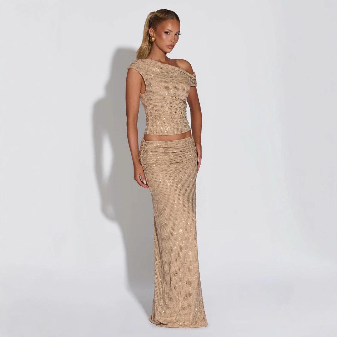 Women Shiny Top with Asymmetrical Cut and Glamorous Rhinestone Details StylebySassy