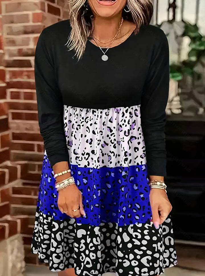 Ladies long-sleeve tiered dress with gathered empire waist and mixed animal print StylebySassy