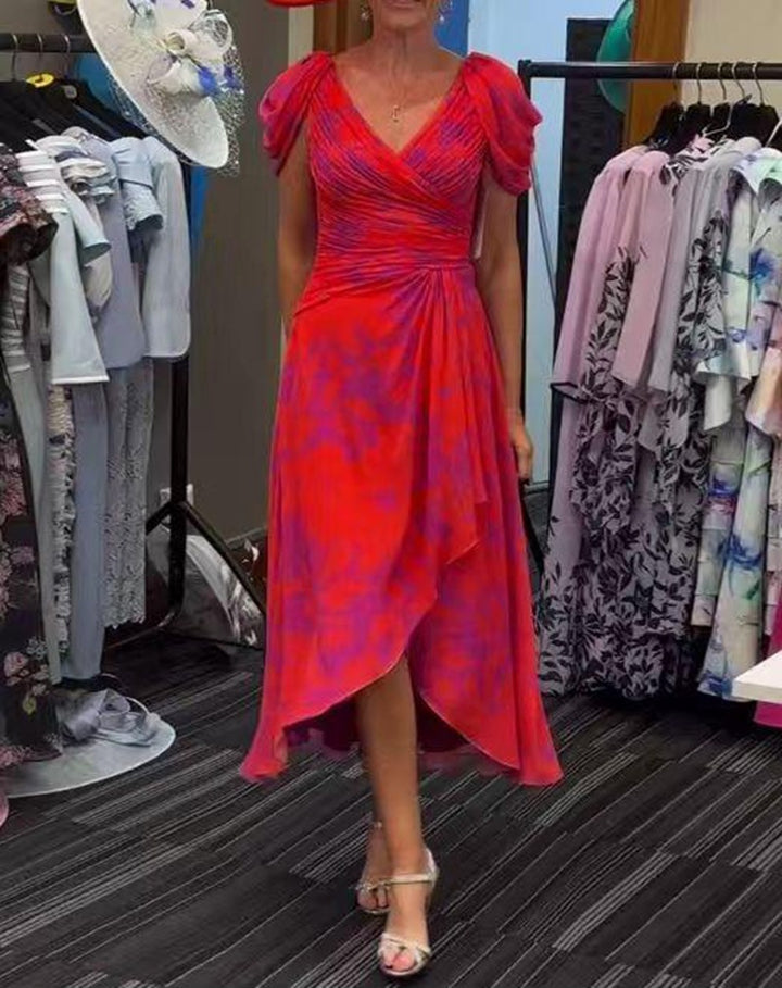 Women's wrap midi dress with ruched bodice, puff sleeves, and asymmetric waterfall hem StylebySassy