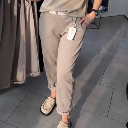 Women's casual cotton chinos with elastic comfort waistband, cuffs, and decorative belt StylebySassy