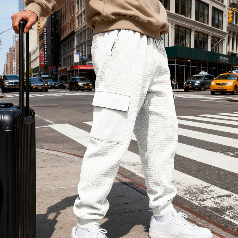 Men's waffle texture cargo pants in jogging style with flap pockets and elastic waistband StylebySassy