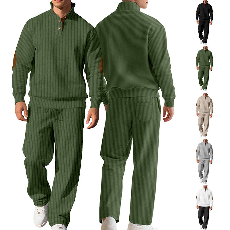 Men's fine ribbed sweater with half button placket, high stand-up collar, and contrasting suede elbow patches StylebySassy