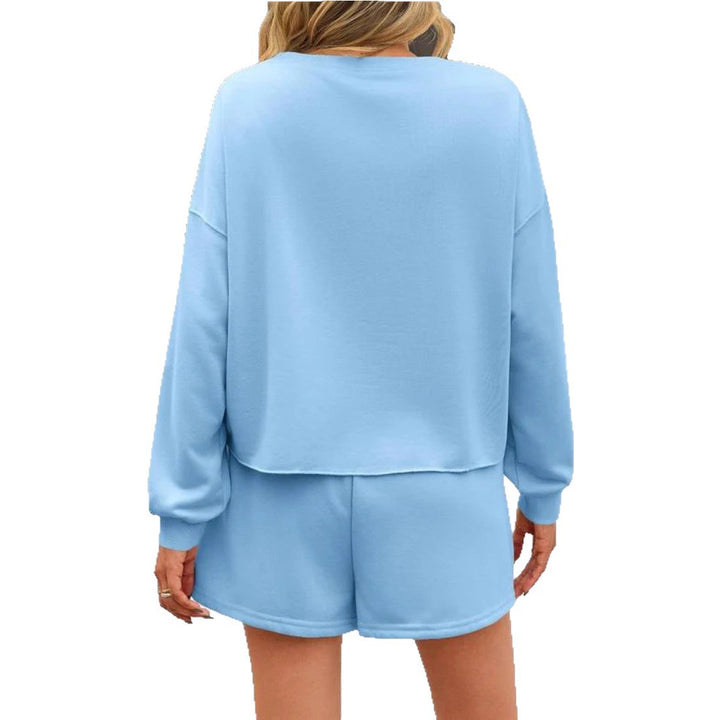 Ladies nan pearl-embellished sweat set with oversized sweater and flared mini skirt StylebySassy