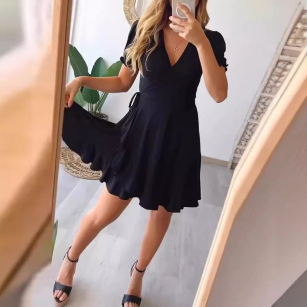 Women’s light wrap dress with V-neck, short sleeves, waist tie, and flounce skirt StylebySassy