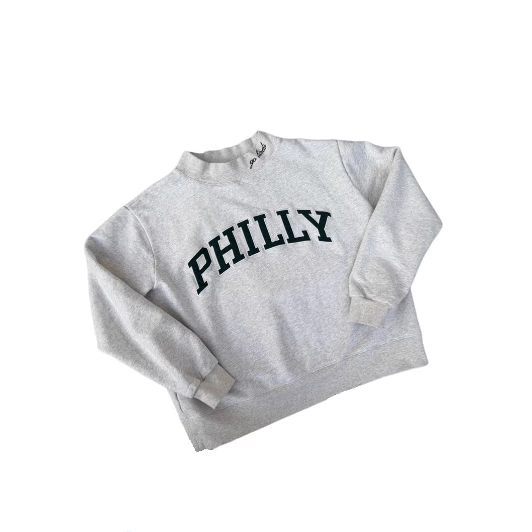 Women's oversized college sweatshirt with high stand-up collar and sewn-on lettering StylebySassy