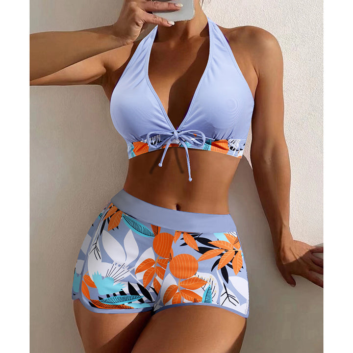 Women's bikini set with sporty high-waist cut and playful floral pattern StylebySassy