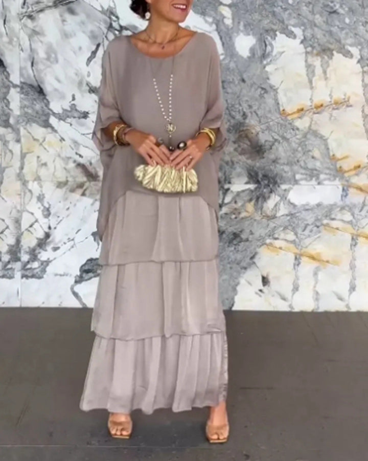 Women's ankle-length tiered dress with wide batwing sleeves and loose silhouette StylebySassy