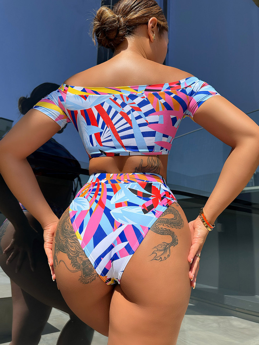 Women's fashionable bikini set with creative cut and colorful geometric design StylebySassy