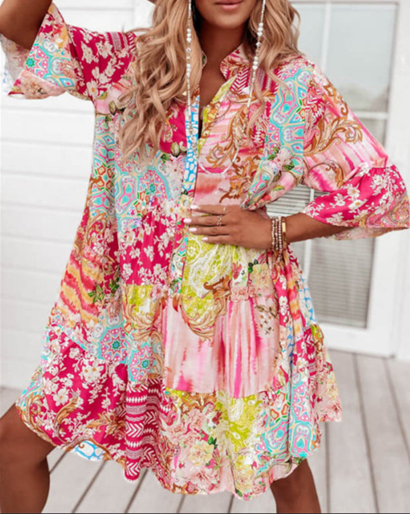 Ladies' airy tiered dress in patchwork boho style with stand collar, gathered waist seam, and three-quarter sleeves StylebySassy