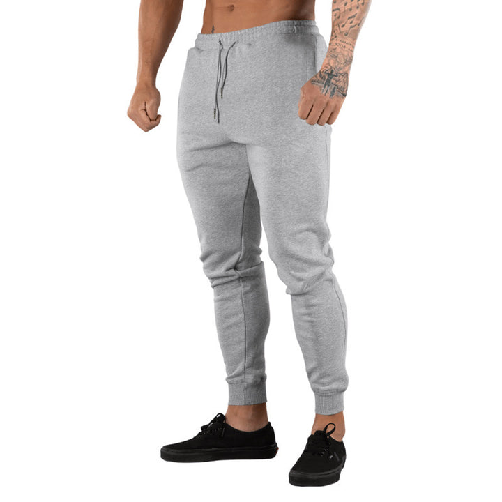 Men's slim fit fleece lounge pants with drawstring, side pockets, and ribbed cuffs StylebySassy