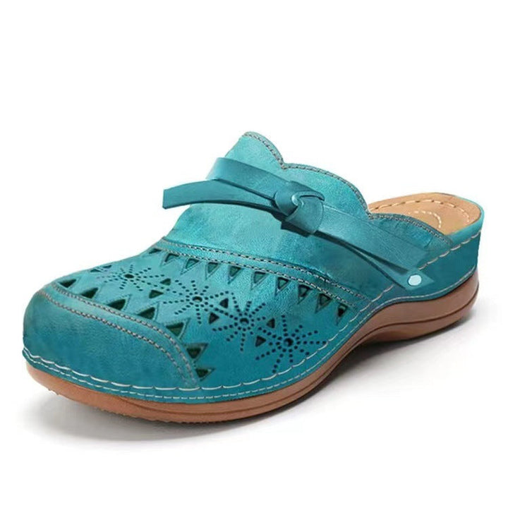 Women Comfortable Clogs with delicate cut-out design and elegant strap StylebySassy