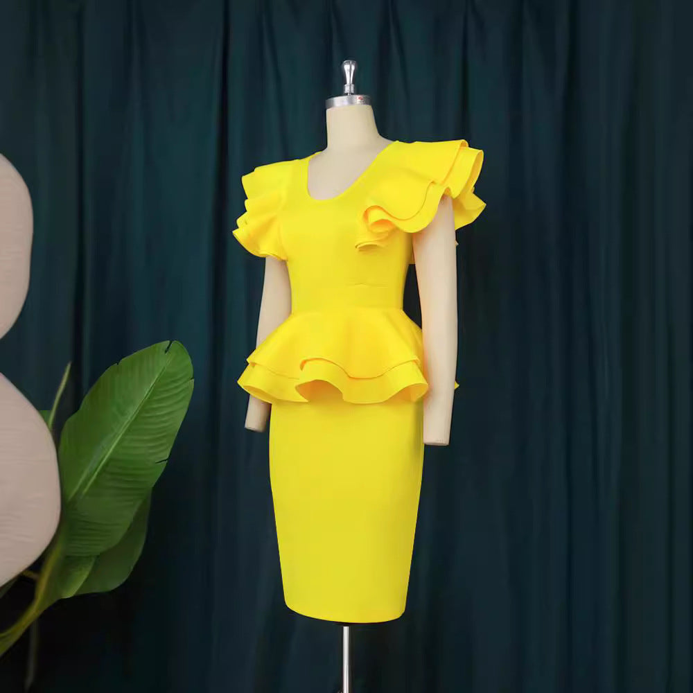 Ladies fitted dress with voluminous ruffle hem StylebySassy