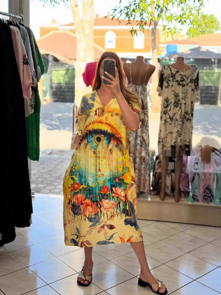 Women flowing maxi kaftan dress with V-neck and large watercolor floral print StylebySassy