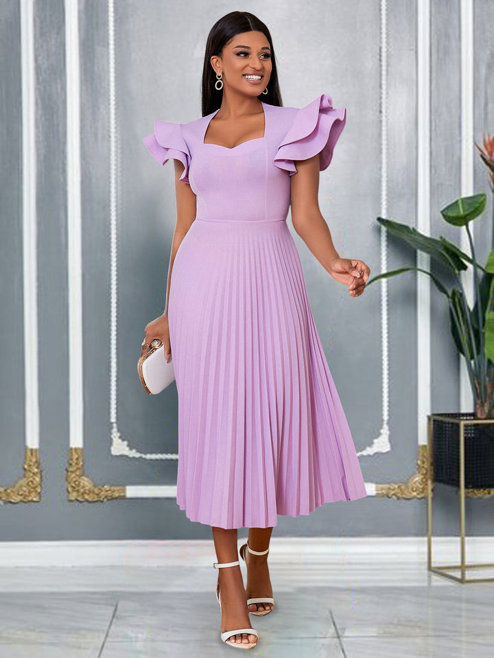 Women's pleated maxi dress with elegant ruffle details StylebySassy