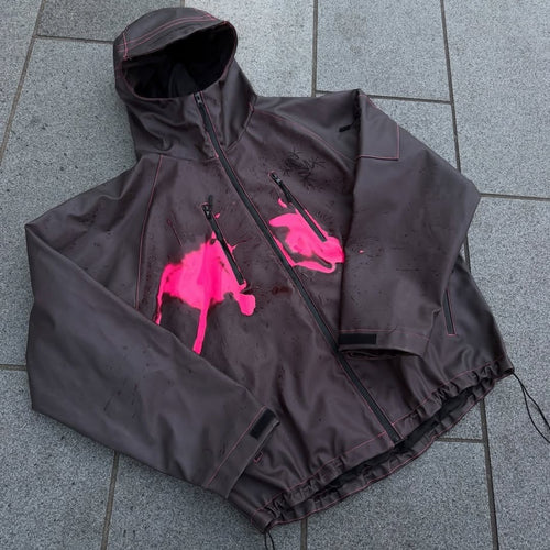 Women's nan waterproof hoodie jacket with splash print design, vertical zippered pockets, and adjustable hem StylebySassy