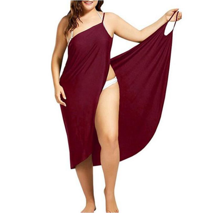 Women's nan versatile beach pareo wrap dress with spaghetti straps and asymmetrical hem StylebySassy