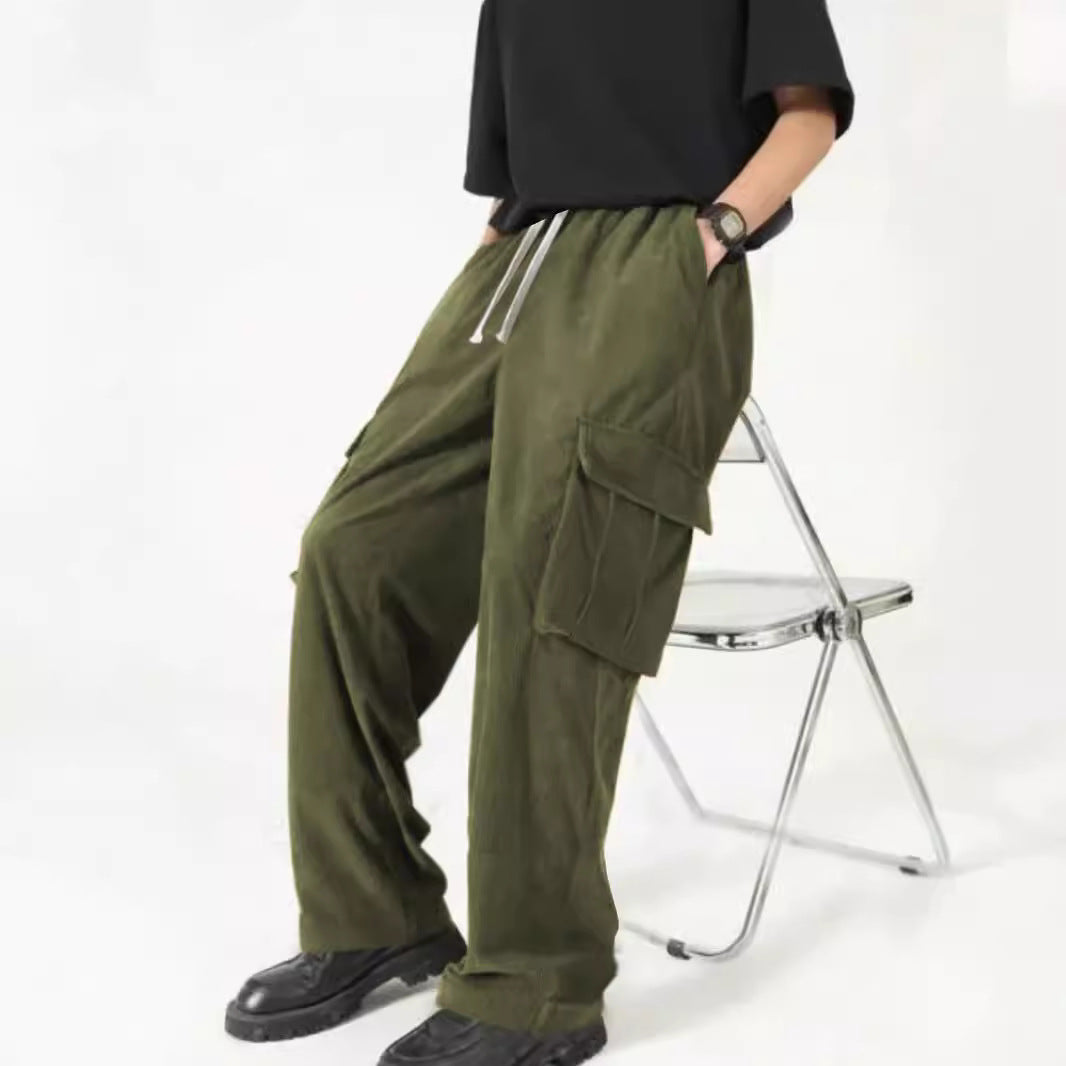 Men's loose wide corduroy cargo pants with drawstring waistband and large flap pockets StylebySassy