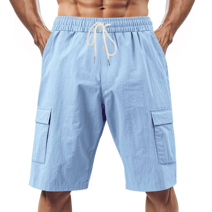 Men's technical cargo shorts with elastic drawstring waistband, secure flap pockets, and quick-drying functional material StylebySassy