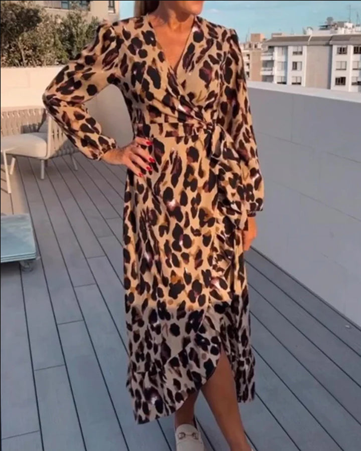 Women’s wrap midi dress with waist tie, V-neck, balloon sleeves and asymmetrical hem StylebySassy