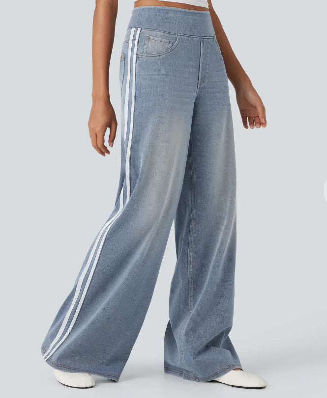 Women's casual wide jogging pants in denim look with elastic comfort waistband, contrasting side stripes and pockets StylebySassy