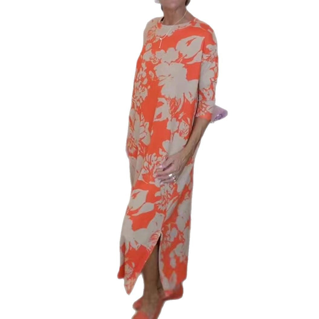 Women’s flowing A-line maxi dress with three-quarter sleeves round neckline side slit and inserted pockets StylebySassy