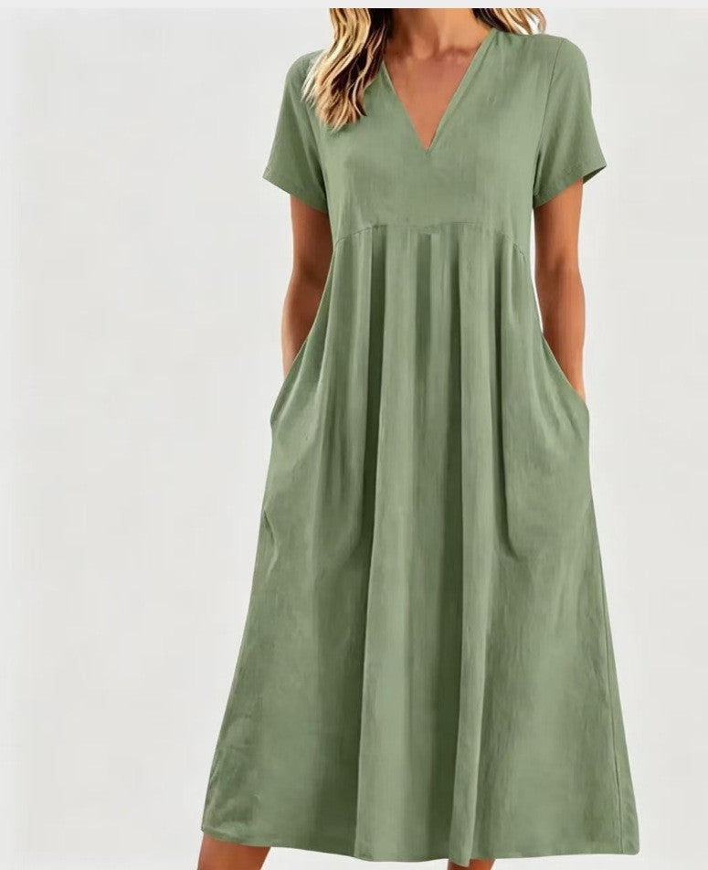 Women nan legeres V-neck midi dress with side pockets and gathered empire seam StylebySassy