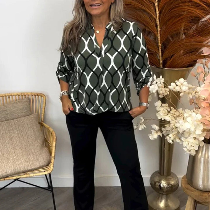 Ladies casual long tunic with V-neck three-quarter sleeves side pockets and geometric chain print StylebySassy