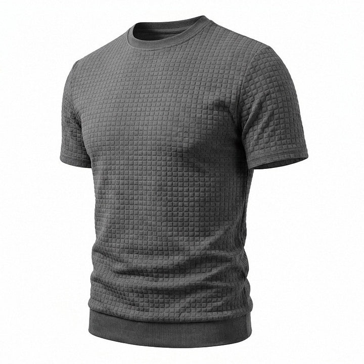 Men's short-sleeved knit shirt with embossed check structure, round neckline, and ribbed hem StylebySassy