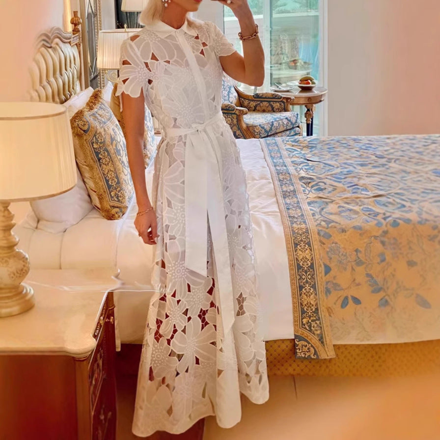 Women's flared maxi dress made of floral embroidery with a shirt collar, button placket, and tie belt StylebySassy