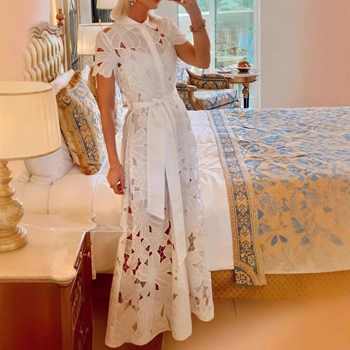 Women's long lace dress with shirt blouse collar, floral cut-out lace, and tie belt StylebySassy
