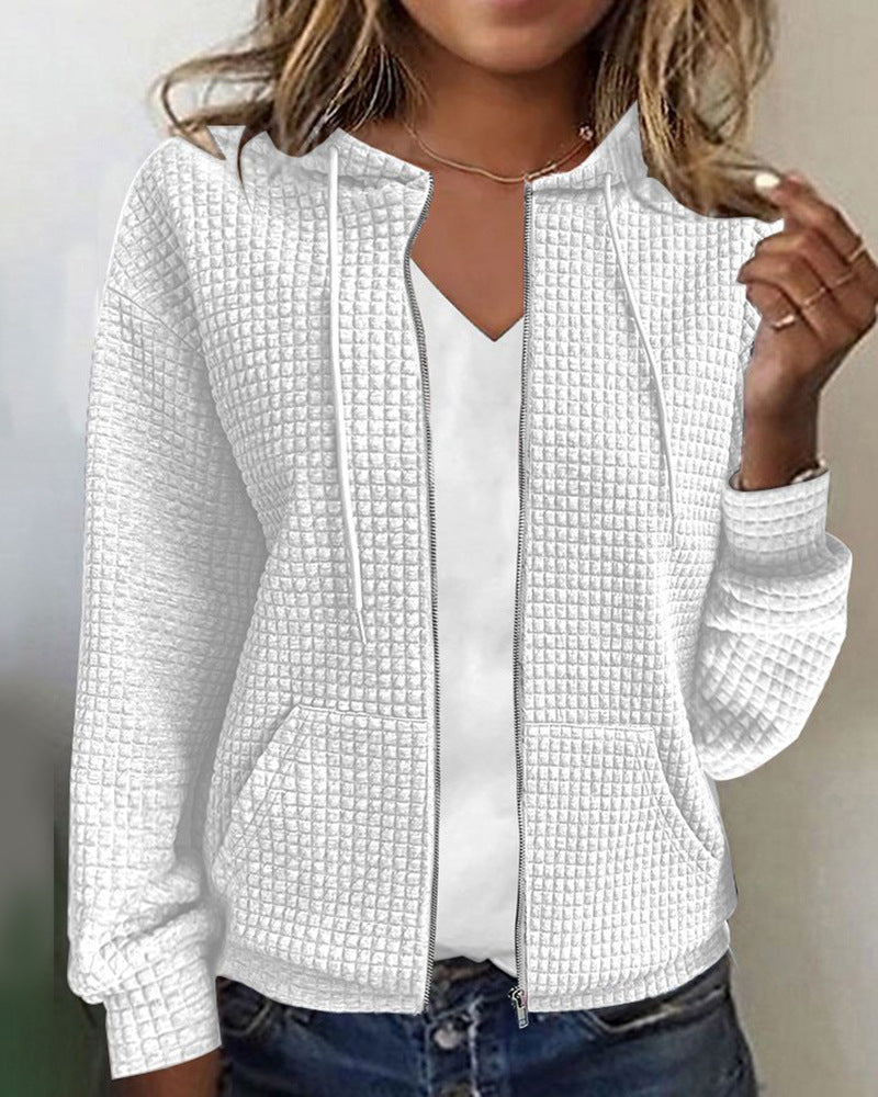 Women's quilted hooded jacket with waffle texture, full zip and kangaroo pockets StylebySassy