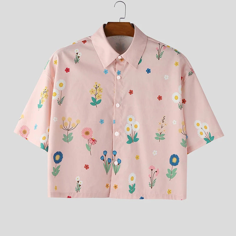 Women's loosely cut short sleeve shirt blouse with floral all-over print, shirt collar and short hem StylebySassy