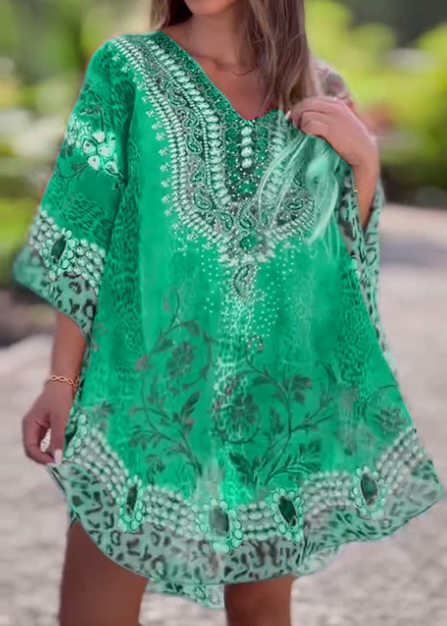 Women's short tunic kaftan with embellished V-neck and floral-animal border StylebySassy